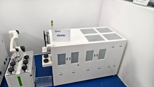 Hans Semiconductor shows a model of a wafer thinning machine